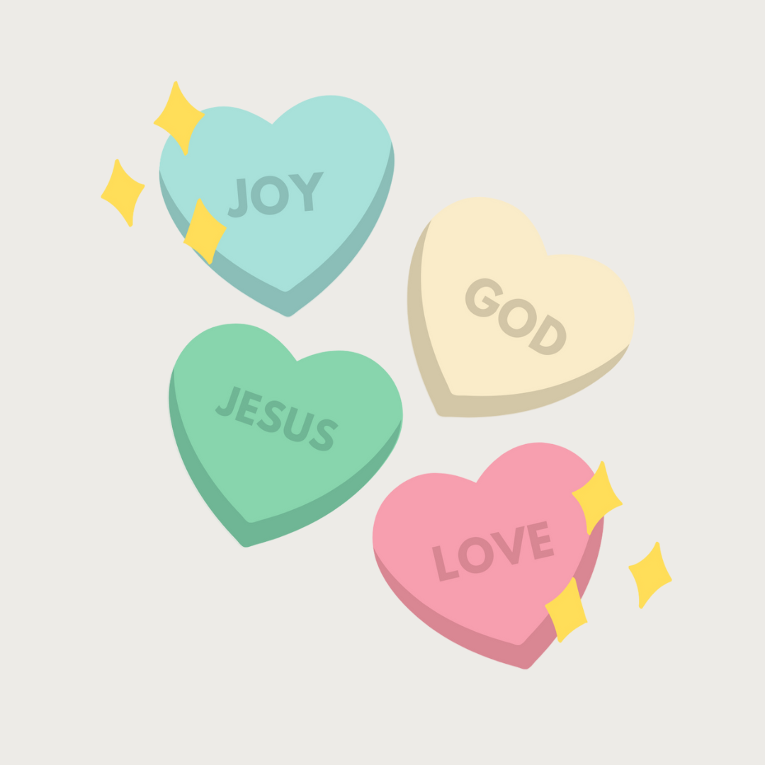 Heart shaped candy with "Joy, God, Jesus, Love" text on them